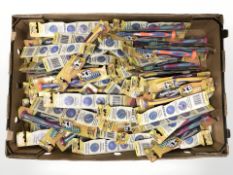 A large quantity of new children's toothbrushes.