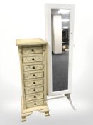 A contemporary eight drawer chest, width 36 cm, and a storage cheval mirror.