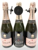 Two bottles of Lanson Le Rose champagne and a further bottle of Le Black Label brut, all 750 ml.