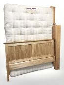 A contemporary 4'6 bed frame with mattress