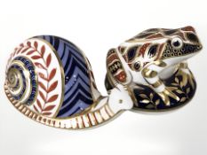 Royal Crown Derby frog and snail paperweights, tallest 7 cm.