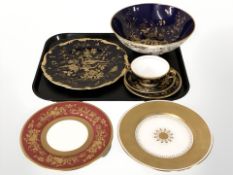 A Minton porcelain fruit bowl on blue ground, similar plate, tea cups and saucers,