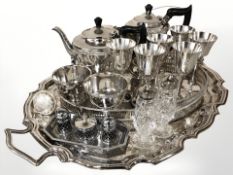 A twin handled EPNS serving tray, width 60 cm containing Lindisfarne pattern EPNS tea service,