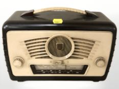 An Ultra Bakelite cased radio.