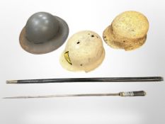 A 1941 dated Zuckermann helmet complete with liner and chin strap and two Third Reich Fire Police