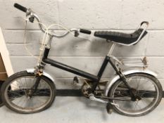 A Raleigh chopper style bike, frame 14.