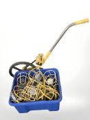 A trundle wheel and a box of site lights