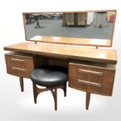 A G Plan Fresco twin-pedestal mirror back dressing table and circular stool,