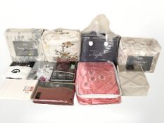 A quantity of quilts, bedding, etc.