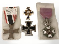 A group of medals of medals comprising a Belgian Order of Leopold,
