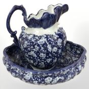 A blue and white transfer printed wash jug and basin