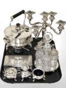A EPNS five sconce candelabra, spirit kettle on stand,
