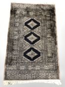 A Lahore Bokhara rug, Pakistan, 150 cm x 93 cm.