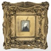19th century English school : miniature portrait of a man wearing a black jacket and cravat,