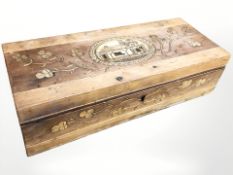 A 19th century Irish Killarney marquetry box depicting a cottage, 27.5 cm wide.