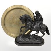 A patinated metal statue of an Arab huntsman on horseback, height 34 cm,