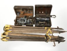 Two surveyor's level tripod stands, a Cooke Troughton & Simms Limited theodolite S042381,