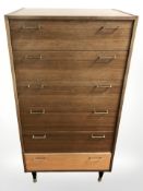 A 20th century teak six drawer chest,