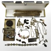 An interesting group of jewellery to include silver cufflinks, gilded two part bracelet,