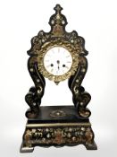 A 19th century ebonised and mother of pearl inlaid eight day mantel clock, signed FL Hausburg,