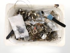 A plastic tub of assorted costume necklaces, bangles, bracelets, wristwatches, etc.