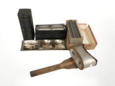 A stereoscope viewer and a quantity of Underwood & Underwood viewing slides