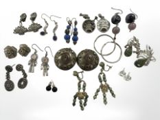 A group of white metal and silver earrings, some mounted with semi precious stones, abalone etc.