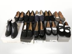 Several pairs of lady's shoes including Vionic and Hushpuppies.