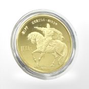 A Chinese 0.917 gold coin, 100 Yuan 1986. CONDITION REPORT: 11.4g.