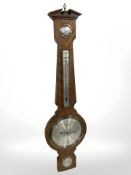 A Chippendale style mahogany mirror and a reproduction barometer