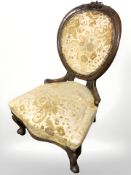 An early 20th century walnut lady's chair