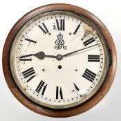 A George V mahogany circular station timepiece, with chain driven single fusée movement,