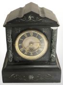 A Victorian black slate and marble eight day mantle clock, with two keys, no pendulum, height 26 cm.