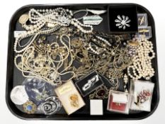 A group of costume jewellery, chains,