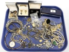A group of costume jewellery, cufflinks, chains,