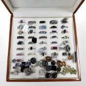 A group of sterling silver and white metal jewellery including approximately 40 dress rings and