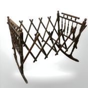 A Victorian beech concertina action rocking crib