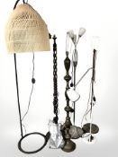 A group of metal and wooden standard lamps