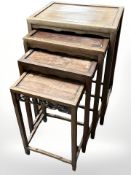 A Chinese nest of four hardwood tables,