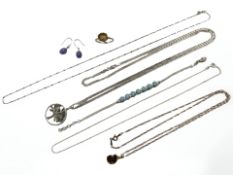 A sterling silver bracelet set with turquoise together with a silver dress ring, silver necklace,