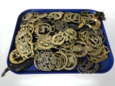 A collection of horse brasses.