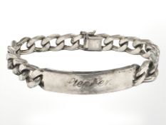 A sterling silver identity bracelet CONDITION REPORT: 60.3g.