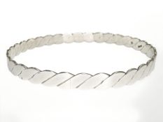 A silver bangle, London 1973, diameter 68 mm. CONDITION REPORT: 14.8g.