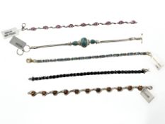 Five Sterling silver bracelets set with semi precious stones