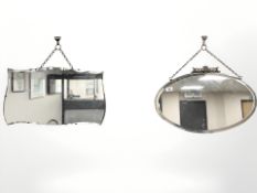 An early 20th century oval mirror with decorative pediment, width 57 cm,