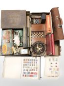 Assorted stamp albums, games, Merit model set, cash tin, slipper box,