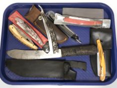 A group of folding cutthroat razors,