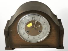 An oak Bentima eight day mantel clock, height 22 cm.