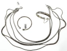 A multi-strand long white metal necklace together with expansion bangle,