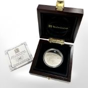 A Queen Elizabeth II 2012 Guernsey Neil Armstrong five pound 0.925 silver coin, 28.